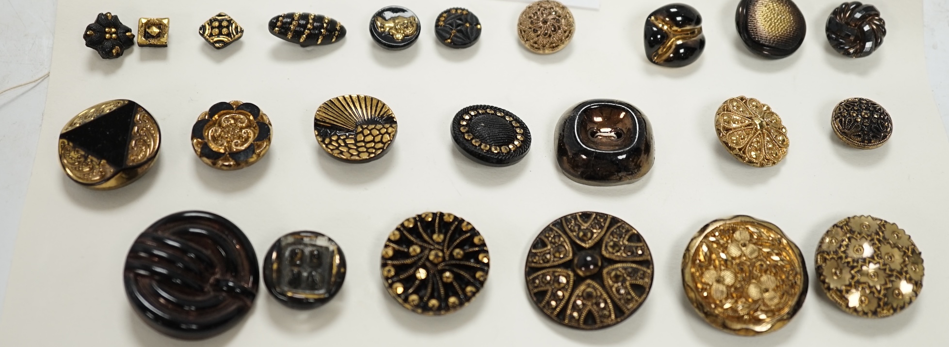 A large collection of Victorian, Edwardian and later buttons, mounted on display cards. Condition - fair